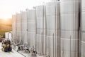 Modern stainless steel barrels for wine fermentation at a winery. Wine industry.