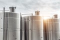 Modern stainless steel barrels for wine fermentation at a winery. Wine industry.