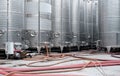 Modern stainless steel barrels for wine fermentation at a winery. Wine industry. Royalty Free Stock Photo