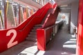Modern stairway with bright red concrete walls and the number 2 Royalty Free Stock Photo