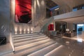 A modern stairwell in a contemporary office building features sleek, minimalist design elements. Royalty Free Stock Photo