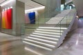 A modern stairwell in a contemporary office building features sleek, minimalist design elements. Royalty Free Stock Photo