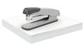 Modern stapler on a stack of paper Royalty Free Stock Photo