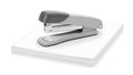 Modern stapler on a stack of white paper Royalty Free Stock Photo