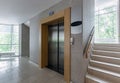 Modern steel elevator. Stairs, interior, office. perspective wide angle.