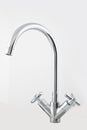 Modern steel faucets, for the kitchen sink. on white background
