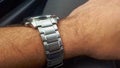 Modern steel watch on hand. Luxury fashion, watch on wrist, Ellegance guy Royalty Free Stock Photo