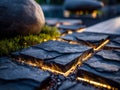 Modern stone pathway illuminated with subtle lighting accents Royalty Free Stock Photo