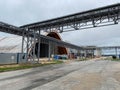 Modern storehouse construction site, structural steel structure of new commercial building against. Construction of modern factory