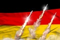 Modern strategic rocket forces concept on flag fabric background, Germany ballistic missile attack - military industrial 3D