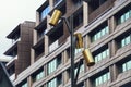 Modern street lamp against modern building in city