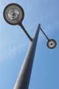 Modern street lamp under a blue sky Royalty Free Stock Photo