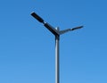 A modern street LED lighting pole. Urban electro-energy technology. Public street lighting pole with LED lights with blue sky Royalty Free Stock Photo