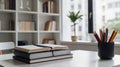 Modern Study Desk with Books and Colorful Pencils Royalty Free Stock Photo