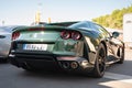 modern and stunning and elegant dark green Ferrari 812 GTS