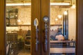 Modern style door handle on glass door Royalty Free Stock Photo