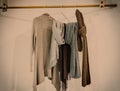 Modern style wardrobe with clothes hanging on wooden hanger Royalty Free Stock Photo