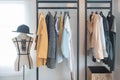 Modern style wardrobe with clothes