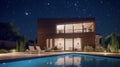 Modern stylish home with large panoramic windows and a swimming pool in the foreground at night in the moonlight. Modern Royalty Free Stock Photo