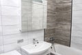 Modern and stylish interior of the bathroom in the apartment, close-up of the washbasin. Royalty Free Stock Photo