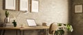 Modern stylish loft working space interior design with laptop on wood table, loft wall
