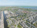 Modern suburb residential area household housing homes aerial drone view. new Build real estate european houses Royalty Free Stock Photo