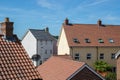 Modern suburban crowded housing estate buildings. Urban house roof tops Royalty Free Stock Photo