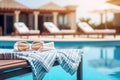 Modern sun lounger with sunglasses poolside at a luxury resort, a serene summer holiday