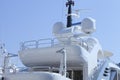 Modern super yacht top deck against blue sky .