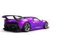 Modern supercar with two tone pink and purple pearlescent paint - rear view