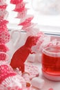 Modern surreal tea party with living coral color toy, sweetness, wonderland morning on windowsiil, unusual still life background