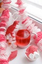 Modern surreal tea party with living coral color toy, sweetness, wonderland morning on windowsiil, unusual still life background