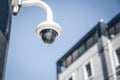 Modern surveillance cameras on the street. Cctv equipment. Blue sky on the background. Protection and control concept.