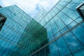 Modern sustainable green glass office building. Exterior view of corporate headquarters glass building architecture. Energy- Royalty Free Stock Photo