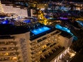 modern swimming pool with blue water illumination on hotel roof top, Tenerife Royalty Free Stock Photo