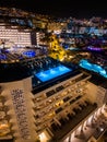 modern swimming pool with blue water illumination on hotel roof top, Tenerife Royalty Free Stock Photo