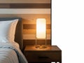 Modern table lamp on bedside table isolated on white background Royalty Free Stock Photo