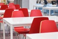 Modern tables and red chairs in shopping malls