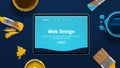 Modern tablet on a blue desk with creative flat design theme od web design studio