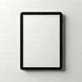 Modern tablet computer with blank screen isolated on white background. Sleek black electronic device, digital gadget, portable Royalty Free Stock Photo