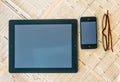 Modern Tablet computer with blank white screen above the Financial Times magazine Royalty Free Stock Photo