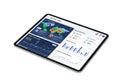 Modern tablet displaying business analytics and data visualization dashboards with graphs and world map Royalty Free Stock Photo