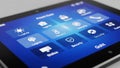 Modern Tablet Displaying Smart Home Control Interface with Icons Royalty Free Stock Photo