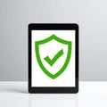 Digital Security Shield on a Modern Tablet Screen Royalty Free Stock Photo