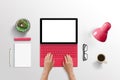 Modern tablet laptop on desk. Woman typing on keyboard. Isolated white screen for mockup Royalty Free Stock Photo