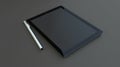 Modern Tablet and Stylus on Dark Surface Royalty Free Stock Photo