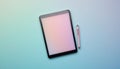 Modern Tablet and Stylus on a Softly Colored Background Displaying Technology in a Minimalist Setting Royalty Free Stock Photo