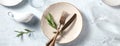 Modern tableware panorama, shot from above with olive branches