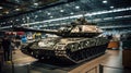 Modern tank inside warehouse of factory, armored vehicle stored in industrial hangar. Interior of military plant. Concept of