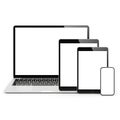 Modern tech devices including laptop, tablets, and smartphone displayed together Royalty Free Stock Photo